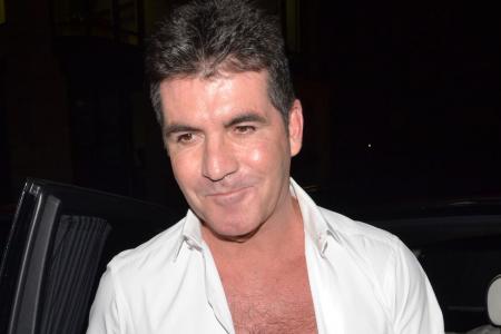 Simon Cowell bandelt mit Carmen Electra an